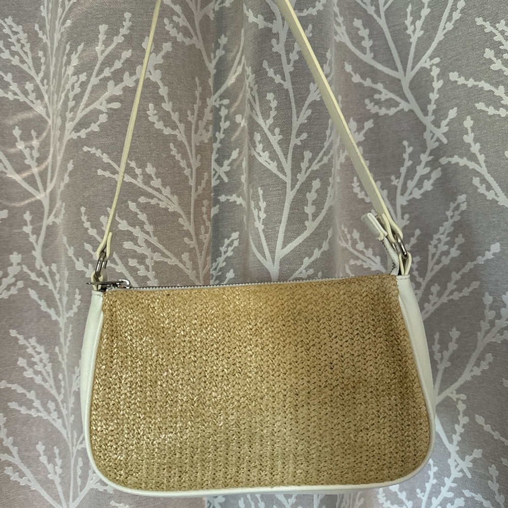 tan and white reversible shoulder bag